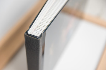 Close up view of photo album book binding - spine view of block