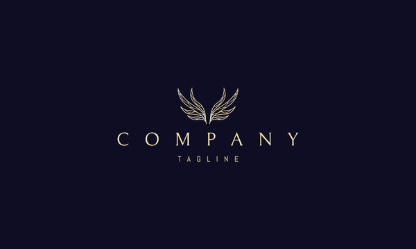 Vector golden logo on which an abstract image of wings in the form of leaves.