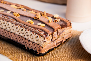 Tasty ice cream pie with decor in macro. Sweet background.