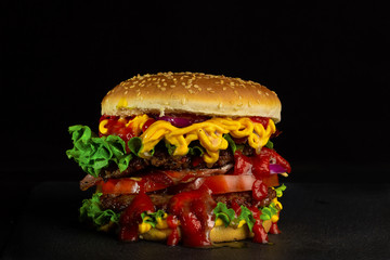 Fresh delicious burger, isolated on Black background