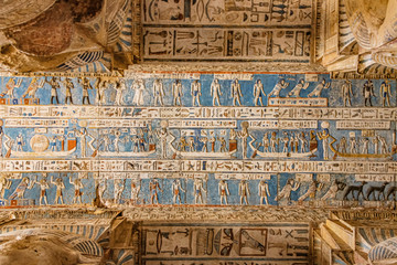 Beautiful interior of the Temple of Dendera or the Temple of Hathor. Egypt, Dendera, Ancient Egyptian temple near the city of Ken. - obrazy, fototapety, plakaty