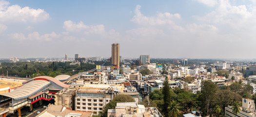 Obraz premium Aerial View of Skyscrapers in Downtown Bangalore With Train Stration in the Foreground