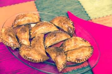 close-up of golden stuffed empanadillas. typical Spanish food
