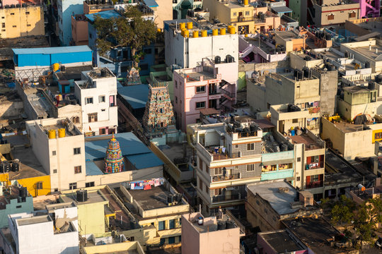 Aerial View of Home Roof Tops in Poor Area of Bengaluru City With Hindu Temples in the Picture