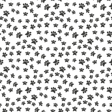 Dog paw print seamless pattern on white background