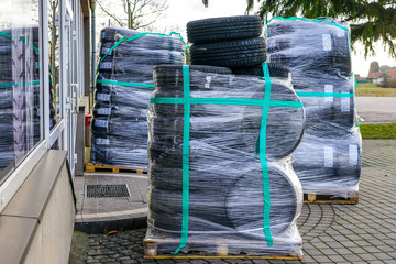 delivery of new season tires to the store on pallets