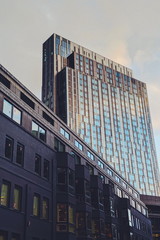 Glass office building at sunrise in City of London
