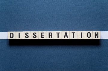 Dissertation word concept on cubes.