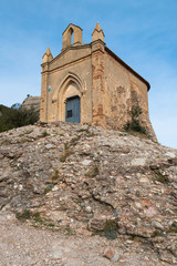 Fototapeta na wymiar Small and old church on top of a mountain