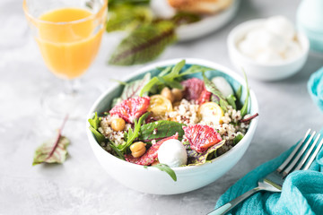 healthy salad with quinoa, vegetables and grapefruit. Horizontal