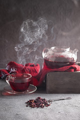 Composition with hibiscus tea on wooden table. Weight loss concept