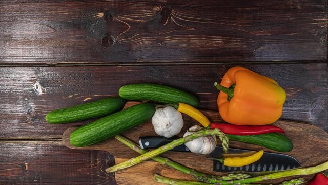 Stop motion.Animation of fresh and organic vegetables moving on kitchen table