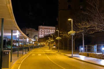 Street next to the Montserrat Monastery at night without people or cars