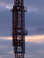 Fototapeta na wymiar crane on background of blue sky