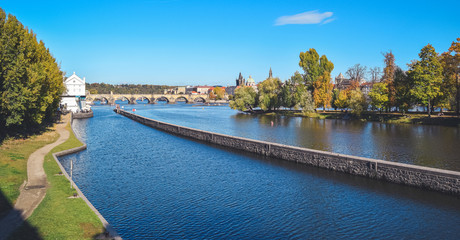 View of Charles bridge from Strelecky island, Autumn, Prague, Czech Republic