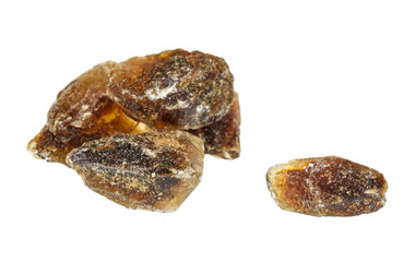 Crystals of candied sugar isolated on white background