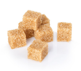 Brown sugar close-up isolated on white background.