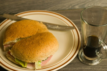 Ham salad sandwich and pot of coffee