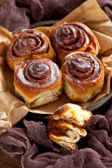 Rolls Cinnabon  with sugar, drizzled with cream glaze