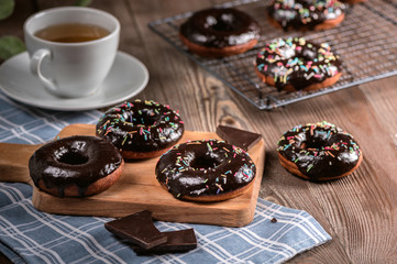 Donuts with chocolate glaze with sprinkles