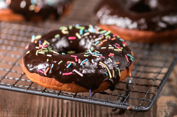 Donuts with chocolate glaze with sprinkles