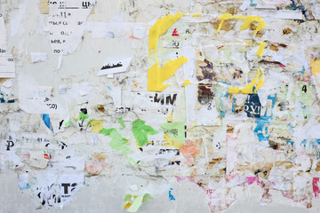 Scraps of old ads on the wall.