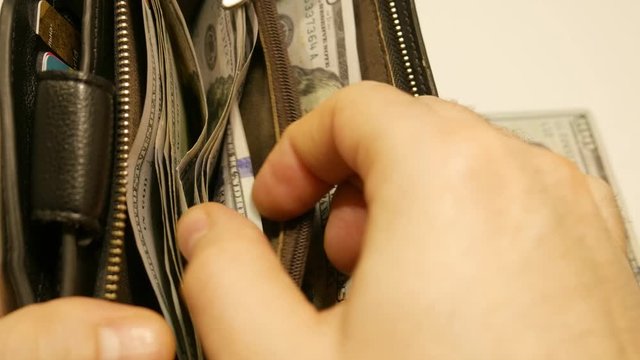  Wallet, purse with money, counting money after luck or failure, taking a cash loan
