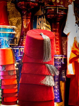Turkish traditional red hat fez, fes or tarboosh with arabic  or Ottoman style