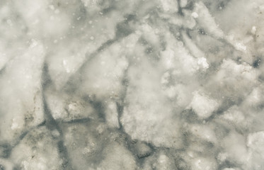 Texture of gray thawed snow
