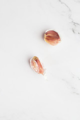Aromatic white garlic cloves isolated on white background. Macro Photo food garlic. Background texture. Plant vegetable garlic. Cooking, spices and kitchen concept.