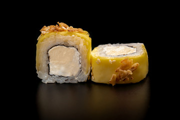 Close up composition of tuna maki sushi rolls japanese food style on a black background