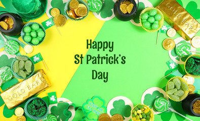 St Patrick's Day creative composition flat lay layout with chocolate coins, leprechaun hat and...