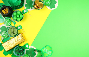 St Patrick's Day creative composition flat lay layout with chocolate coins, leprechaun hat and...