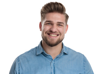 Fototapeta premium Cheerful casual man laughing and looking forward