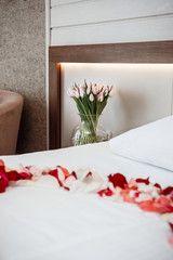 Romance in the bedroom with tulips