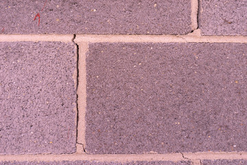 Fototapeta premium Closeup Of Crack In Concrete Block Wall 