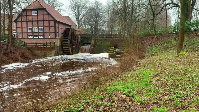 after heavy rain the water at the monastery tavern in hude is high and restless