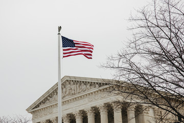 Fototapeta premium Supreme court of the United States and American flag
