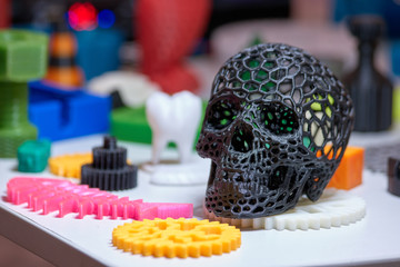 Stainless steel hollow grid skull made by 3d printer. Collection of printed 3d details.