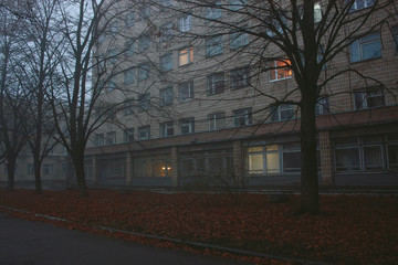 Fototapeta premium Atmospheric cityscapes on a foggy cloudy autumn evening.
