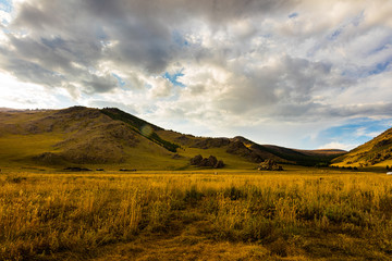 The sun goes down at Mongolia , Sunset Landscape photography in the Mongolian steppe at...