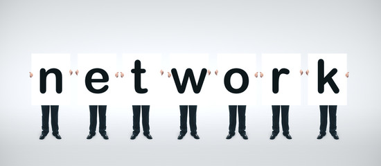 Seven businessmans holding banner with network symbol