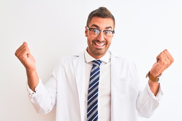 Young handsome therapist man over isolated background celebrating surprised and amazed for success with arms raised and open eyes. Winner concept.