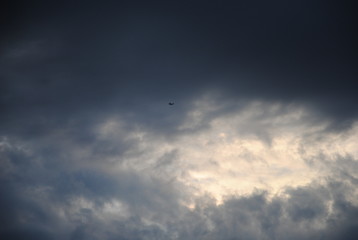 Plane on a cloudy sky