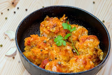 Beef meatballs with tomato sauce in a saucepan. fast cooking