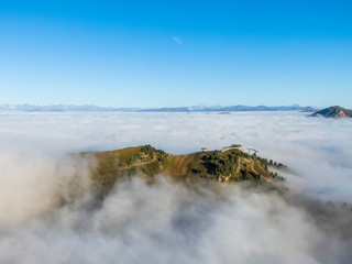 Cloud see around upper station of the Ciampinoi cable car in Italian Dolomites