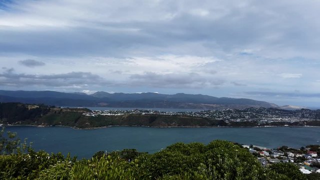 Time lapse, clouds rolling over wellington city in the morning