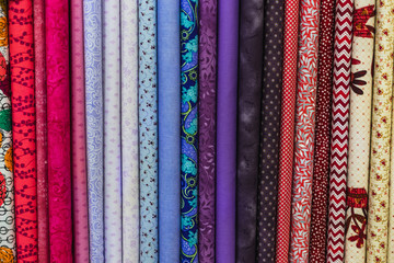Several fabrics in different patterns and colors