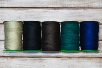 Colored laces on wooden table