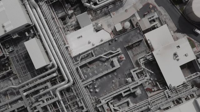 Aerial top down view of a futurisic technology manufacturing plant.